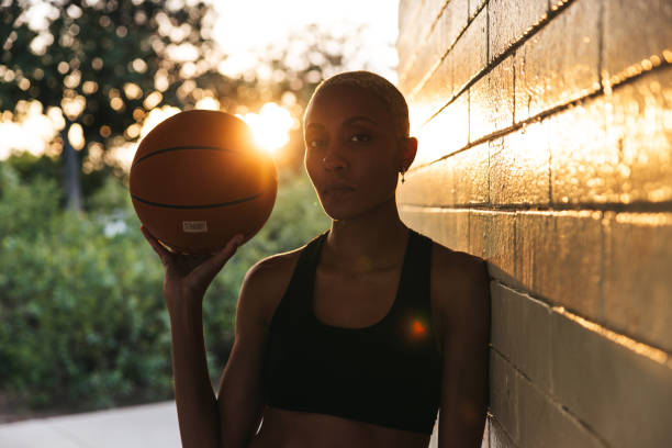 istock Basketball player portrait in silhouette at sunset 2148827280