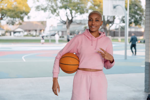 istock Young woman make a victory sign to the camera 2148828183