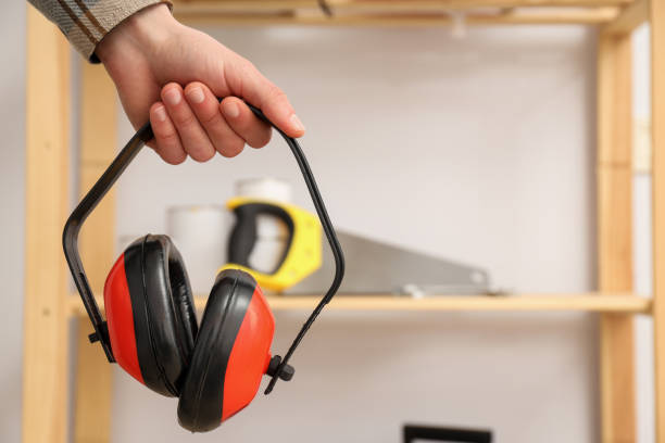 istock Noise canceling headphones in hand on light background, space for text 2148828912
