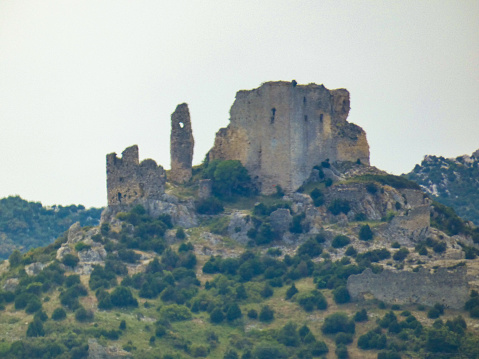 Photo of the ruins of queen Jeanne's castle ( or Roquemartine castle ) at the top of its hill in the Alpilles at Eyguieres.
This photograph was taken in Provence in France.
