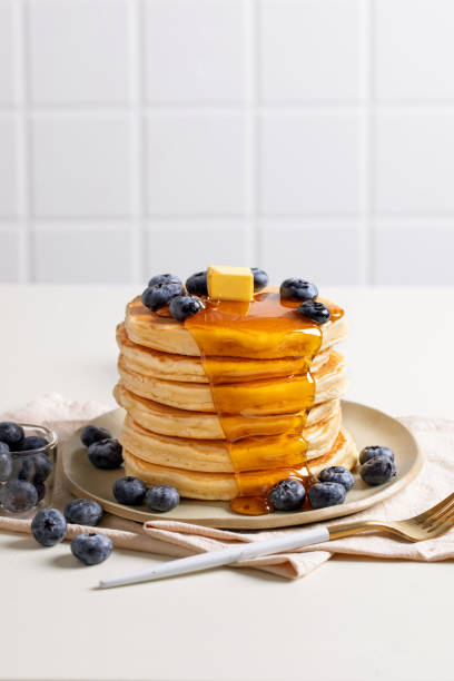 istock pancakes, with fresh blueberries and maple syrup 2148831797