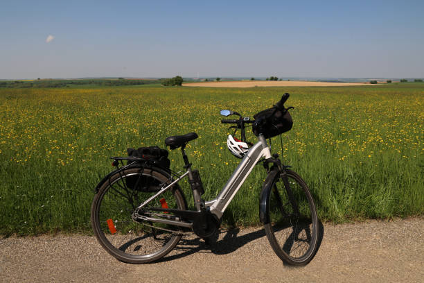 istock Summer landscape with an e-bike on the way 2148833421