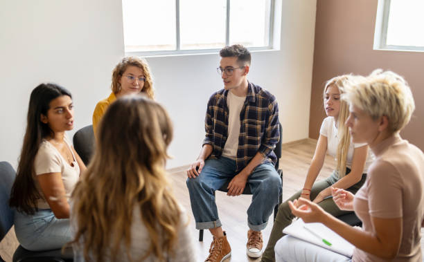 istock Young adults chatting with a counsellor 2148833666