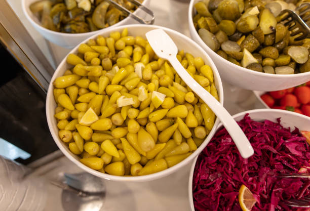 istock Pickled chili peppers in a plate in a restaurant 2148834040