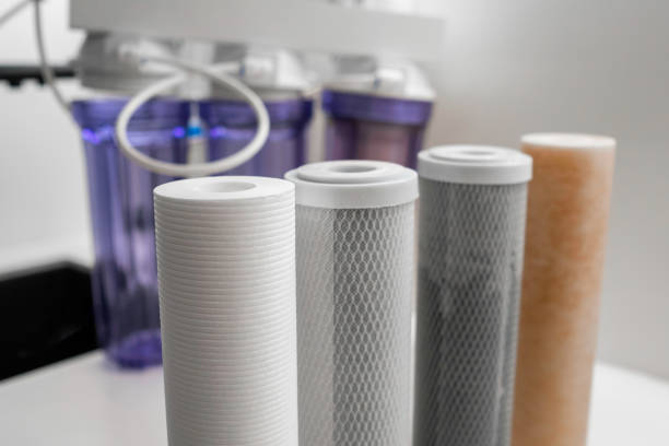 istock Filters for reverse osmosis on the table for water purification in the modern kitchen 2148836970
