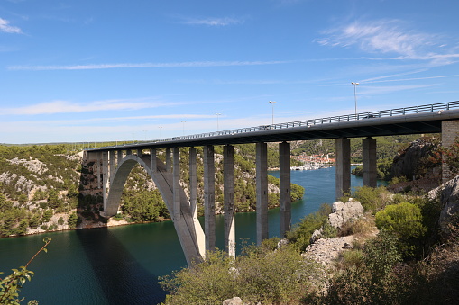 Road bridge over the Krka River in Croatia. City of Skradin.