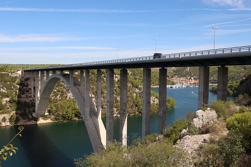 Road bridge over the Krka River in Croatia. City of Skradin.