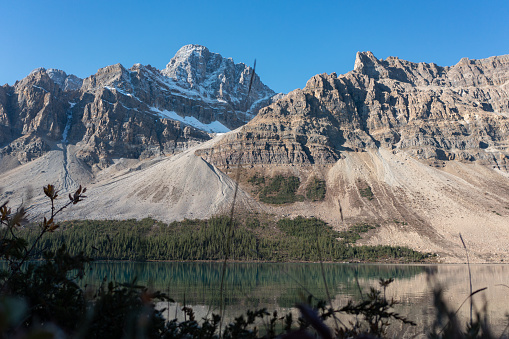 Crowfoot Mountain in autumn with snow as seen from Bow Lake, Canadian Rockies.