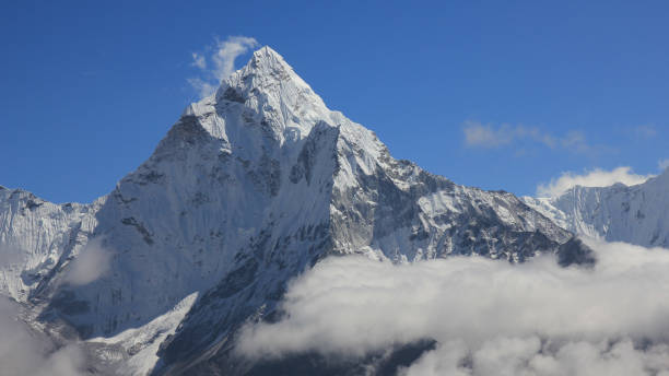istock Snow capped peak of Mount Ama Dablam surrounded by clouds, Nepal. 2148839472