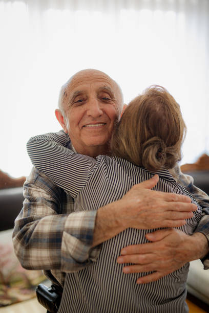 istock Daughter Embracing Her Senior Father 2148840122