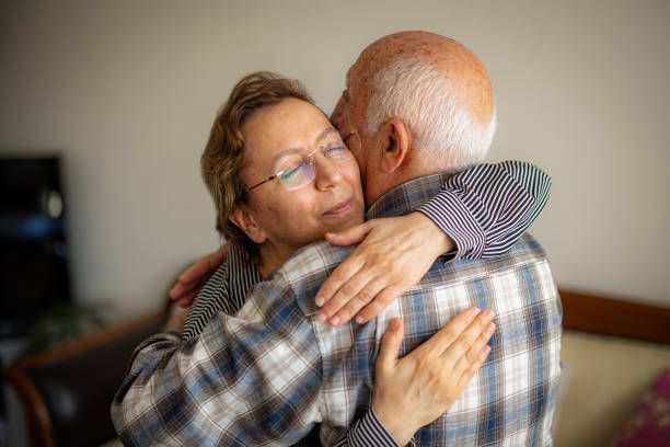 istock Daughter Embracing Her Senior Father 2148840273