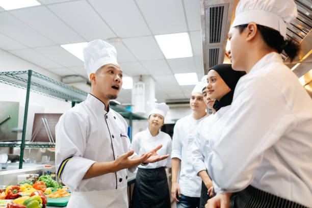 istock Professional chef conduct a cooking class in commercial kitchen 2148840447