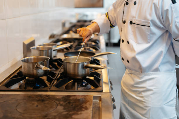 istock Chef cooking soup in commercial kitchen 2148840632