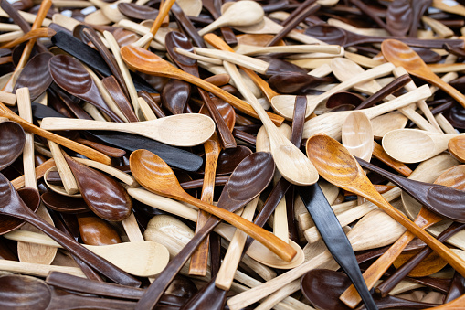a lot of wooden spoons