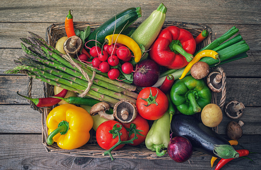 Basket full of fresh healthy organic vegetables