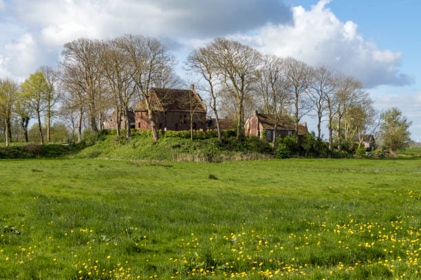 istock view of a small village on a mound. 2148842835