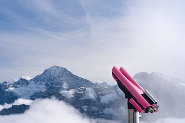 istock Tower viewer binoculars on top of a mountain in Switzerland 2148843080