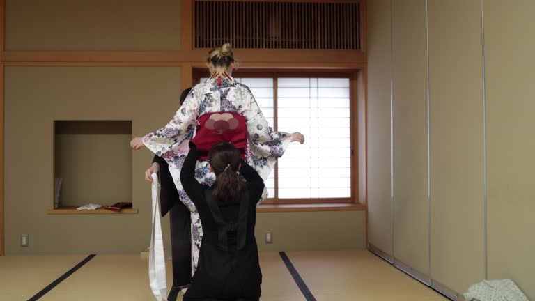 Female tourists wearing kimono in Japanese tatami room - part 1 of 2