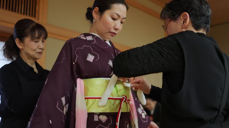 Female tourist wearing kimono in Japanese tatami room - part 3 of 4