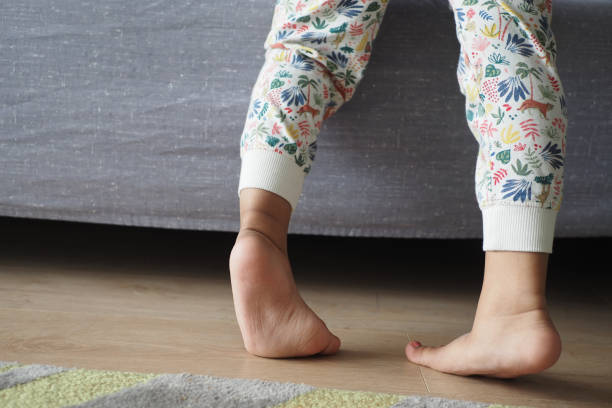 istock low angle view of A child walking on tiptoes 2148845403