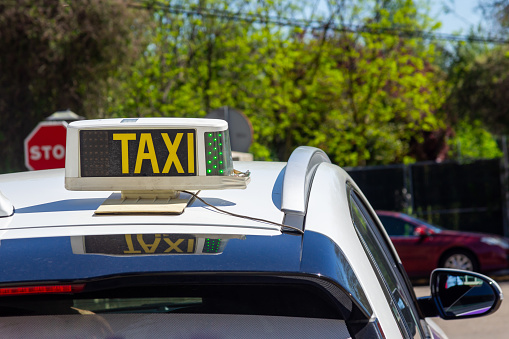 Service Signal: Detail of a Taxi Roof as a Means of Metropolitan Mobility.