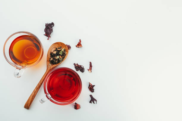 istock Dried tea heaped teaspoonful on white background, closeup 2148847439