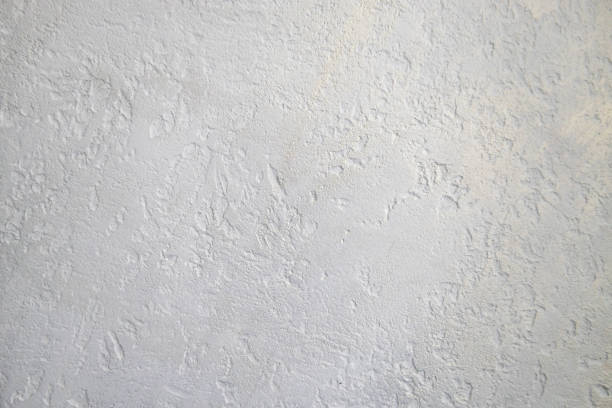 Beautiful Silver white background texture - abstract background from plaster covered mother-of-pearl enamelled