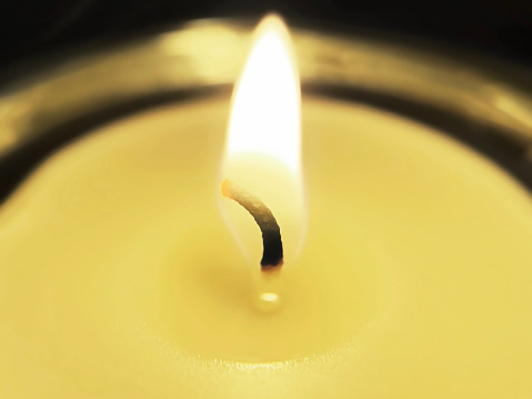 flame of a burning candle close-up