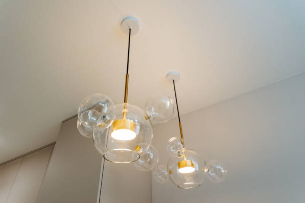 istock Ceiling light with amber bubbles, resembling liquid jewellery 2148849051