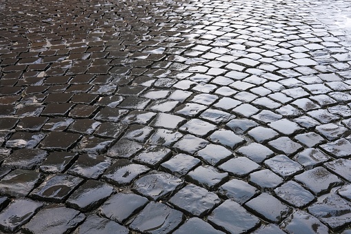 road with wet paving stones