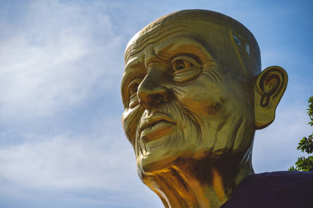 istock Big Golden luang pu thuad Statue on koh lan island 2148851088