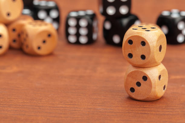 istock Dice on a wooden table. Concept for business risk. 2148852852