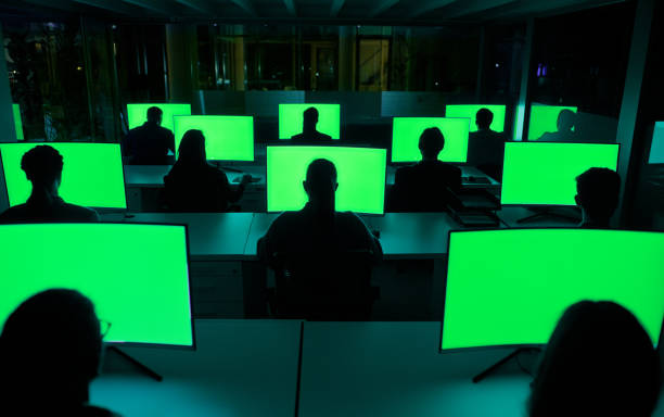 istock People, group and data center with computer green screen with mockup space for safety tracking, programming or together. Colleagues, technology and cctv surveillance, control room or cybersecurity 2148853331