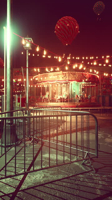Spinning Merry Go Round With Carousel in Night