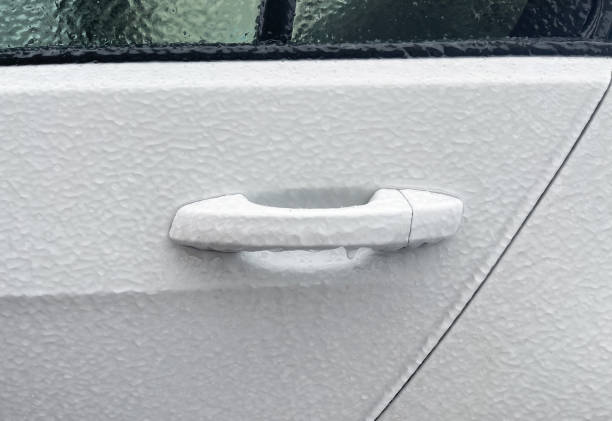 istock Car door handle covered in ice 2148855225