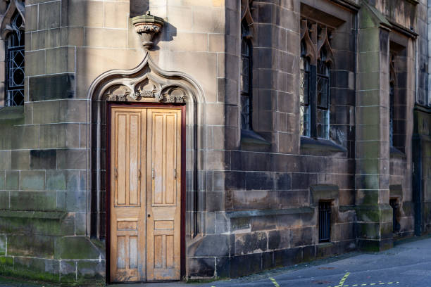 Old wooden door near the Royal Mile (high street) - Edinburgh, Scotland, United Kingdom