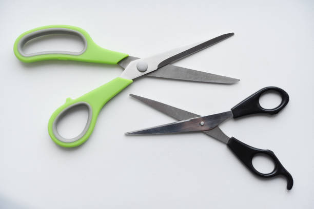 istock Sewing scissors on a white background. Green scissors. 2148859326