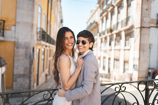 Lesbian couple outdoors in Lisbon, Portugal