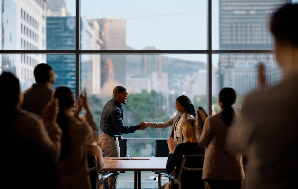 istock Handshake, business people and team with applause for promotion, agreement or support with congratulations. Collaboration, meeting or introduction with welcome at company, shaking hands and success 2148861843