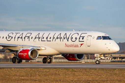 Graz, Austria - December 29, 2023: Embraer 195 of Austrian Airlines in Star Alliance livery lining up the runway in Graz Thalerhof