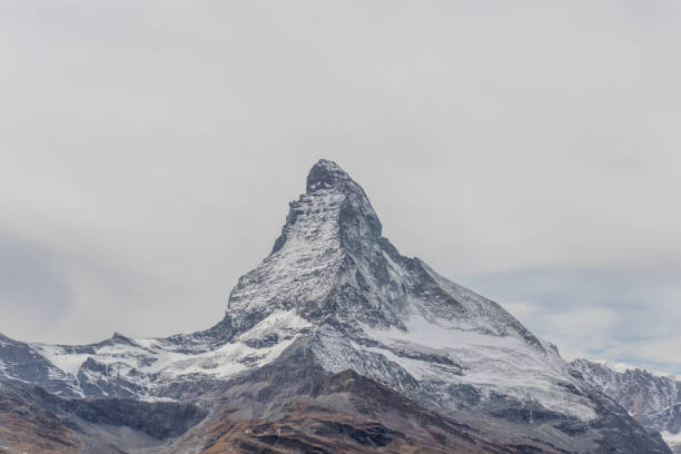 istock Snowcapped mountain with cloudy sky creates a mystical natural landscape 2148863056