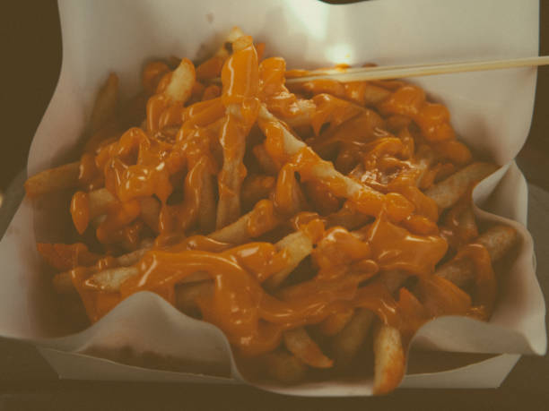 istock cheese french fries 2148863602