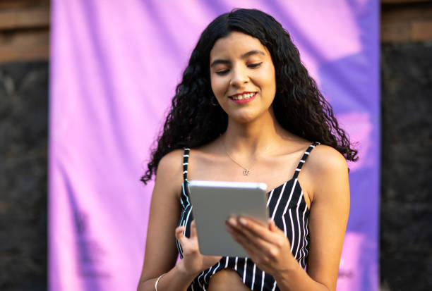 istock Portrait of a young student using her tablet 2148866890
