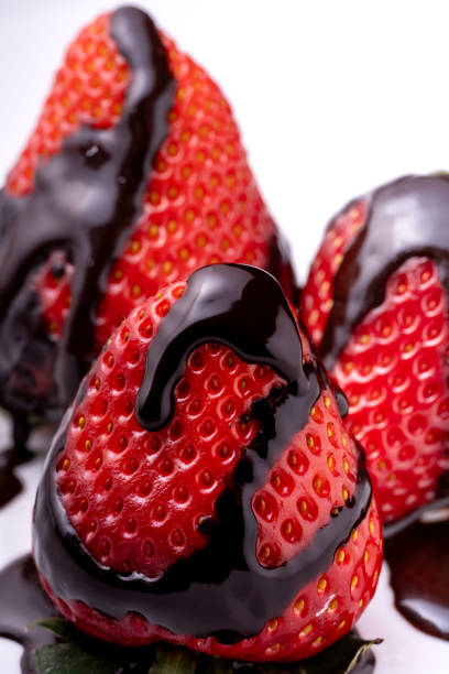 istock fresh strawberries with melted chocolate 2148867598