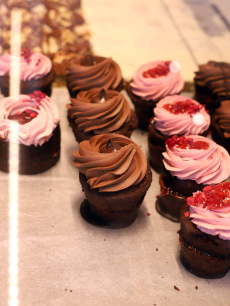 istock Freshly made chocolate and cream muffins 2148871174