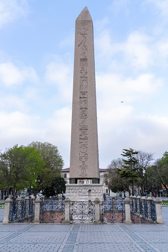 Obelisk of Theodosius (Dikilitas) with hieroglyphs in Sultanahmet Square in Istanbul, Turkey. Ancient Egyptian obelisk in Istanbul, Turkey.