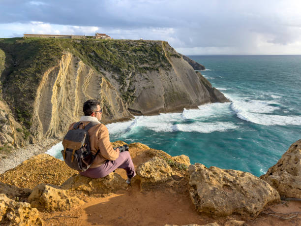 istock Backpacker on the coast of Sesimbra 2148871960