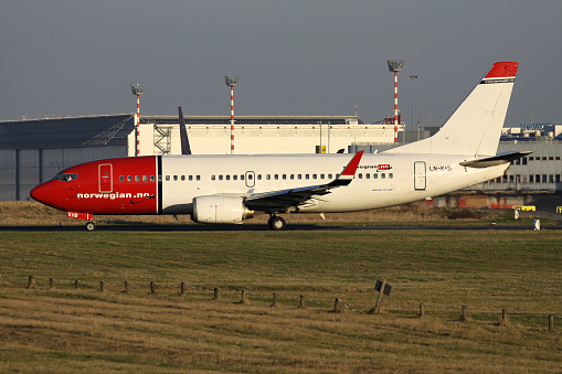 Dusseldorf, Germany - January 15, 2012: Norwegian Air Shuttle Boeing 737-300 with registration LN-KHB on taxiway at Dusseldorf Airport