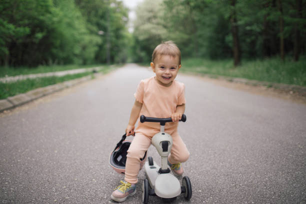 istock Smiling toddler on the push scooter 2148873268
