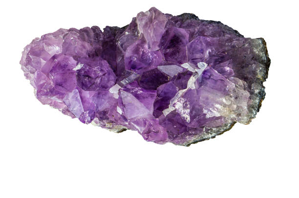 Purple and yellow Fluorite with white calcite photography isolated on white blackground. From USA. macro detail  background. close-up Rough raw unpolished semi-precious gemstone.